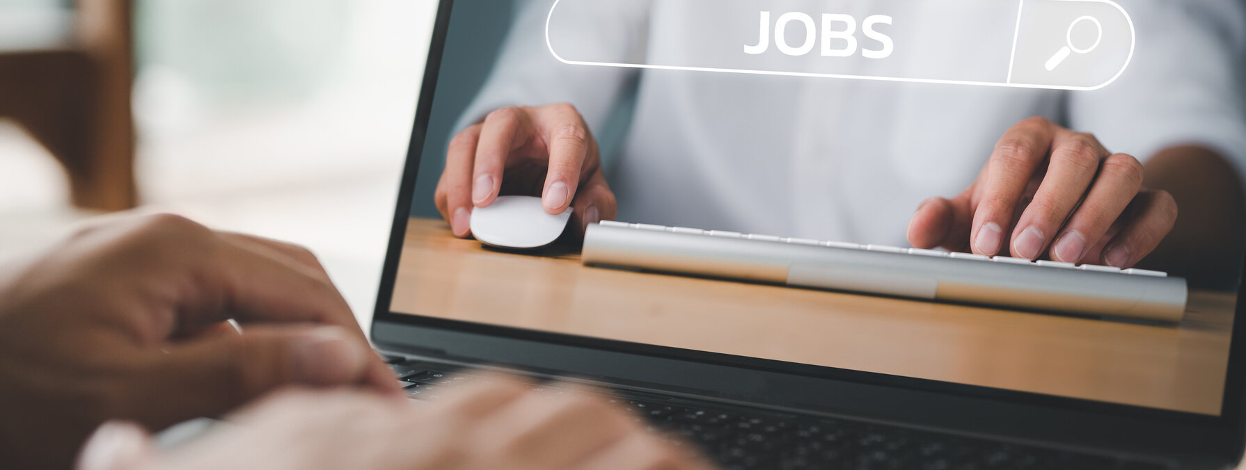 job search concept, man browsing work opportunities online using job search computer app. find your career, man looking at online website by laptop computer.